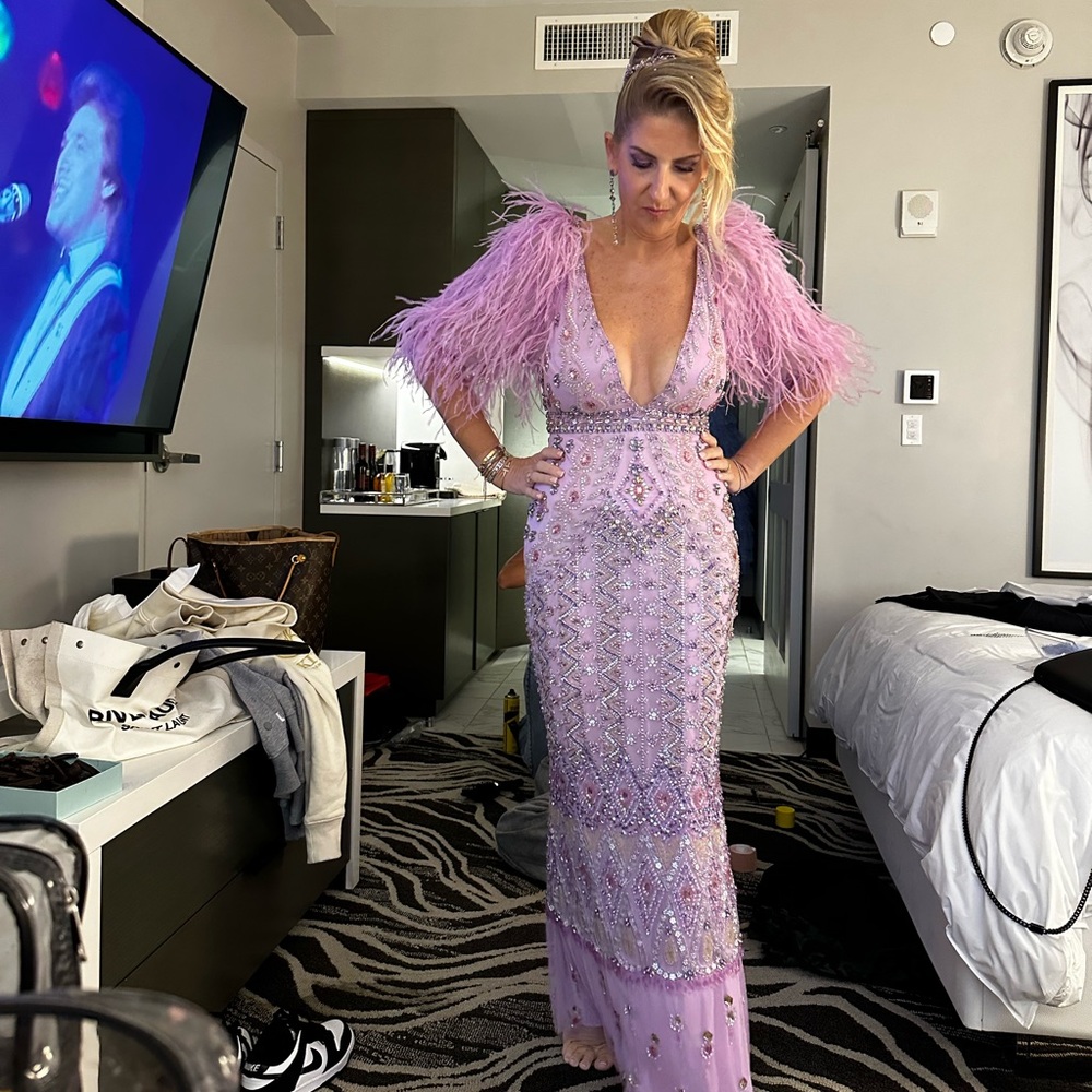 beautiful stone purple dress with feathers